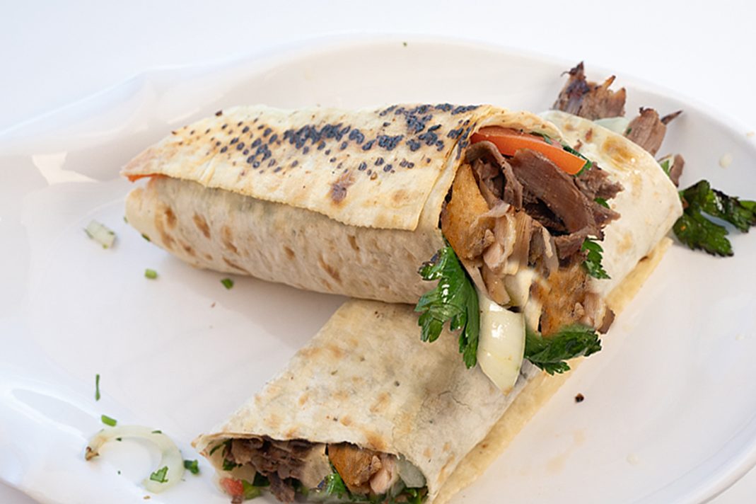 perfect blend of flavors with Anas Mix (Chicken & Beef) Shawarma Wraps. Served on SAJ and PITA